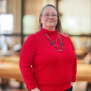 Stephanie Murry account executive red shirt glasses